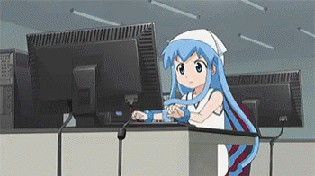 Me making this site Woman types at a computer.